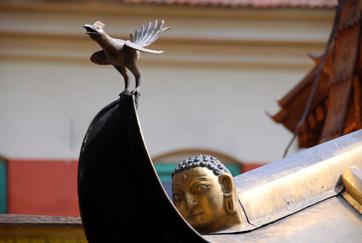 Kathmandu Patan Golden Temple 14 Swayambhu Chaitya Corner Close Up Of Carved Bird and Head 
